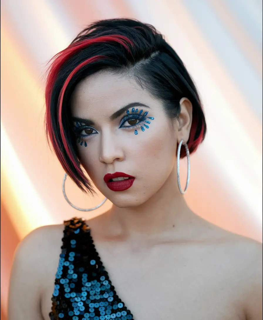 summer hairstyles Bold Asymmetrical Pixie with Fire Red Highlights
