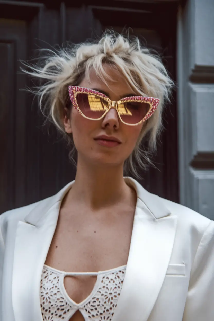 Short Summer Haircut 2025: Chic Styles - Messy Platinum Shag with Rocker Energy