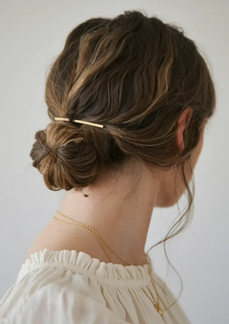 Summer Easy Hairstyle for Work: Low Textured Bun with Gold Hairpin