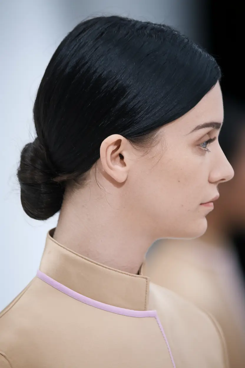 summer simple hairstyles Low Sleek Knot with a Side Part