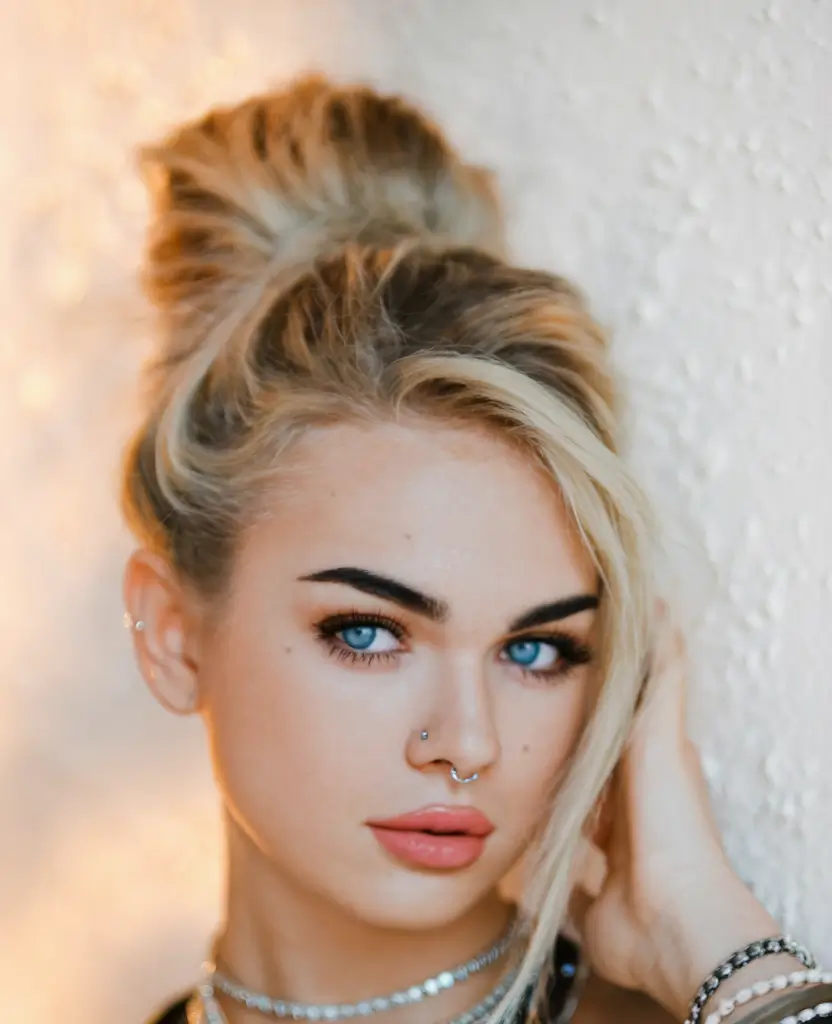 summer updo hairstyles 2025 Messy Textured Top Knot