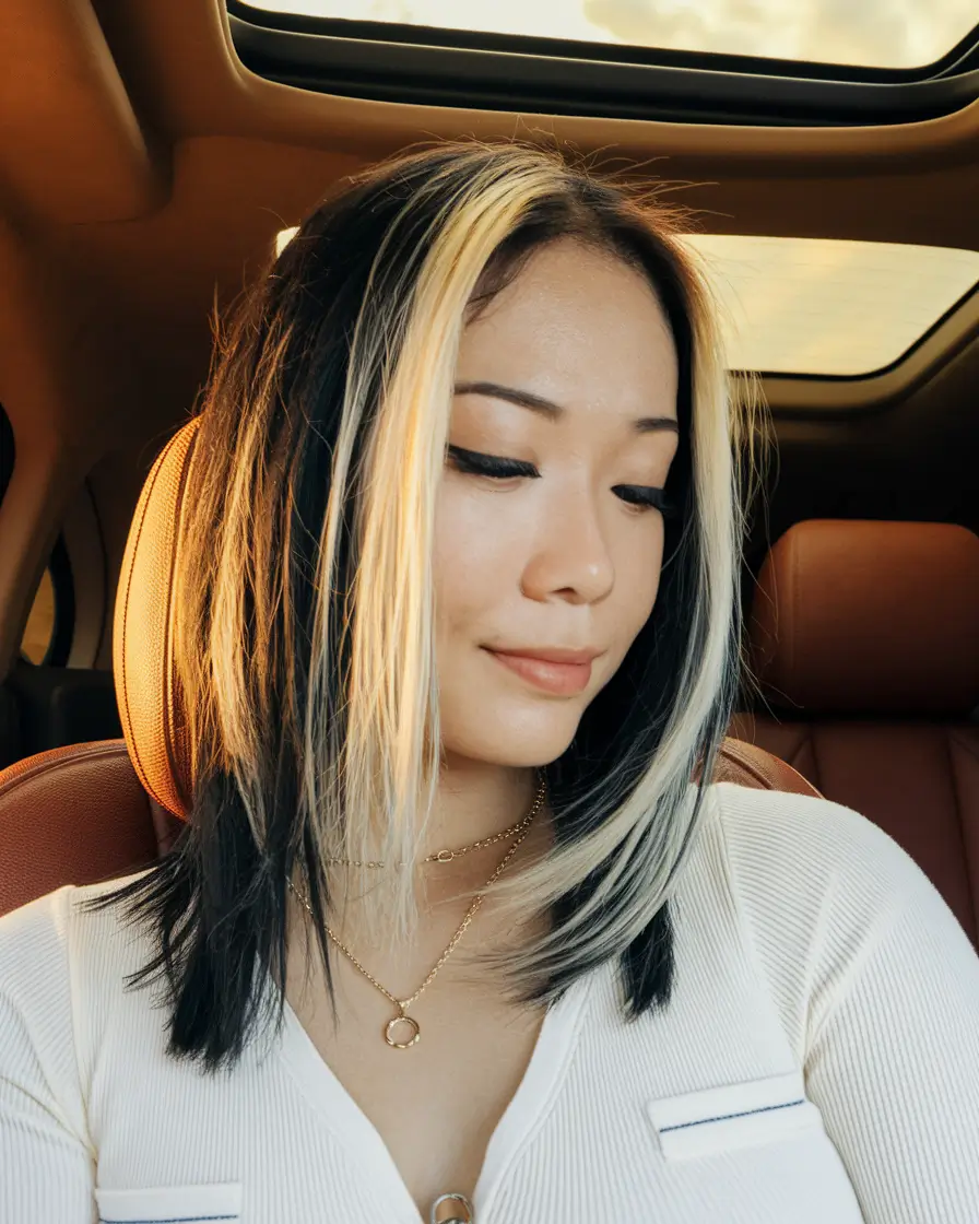Fall haircuts women over 40 Two-Tone Mid-Length with a Bold Streak