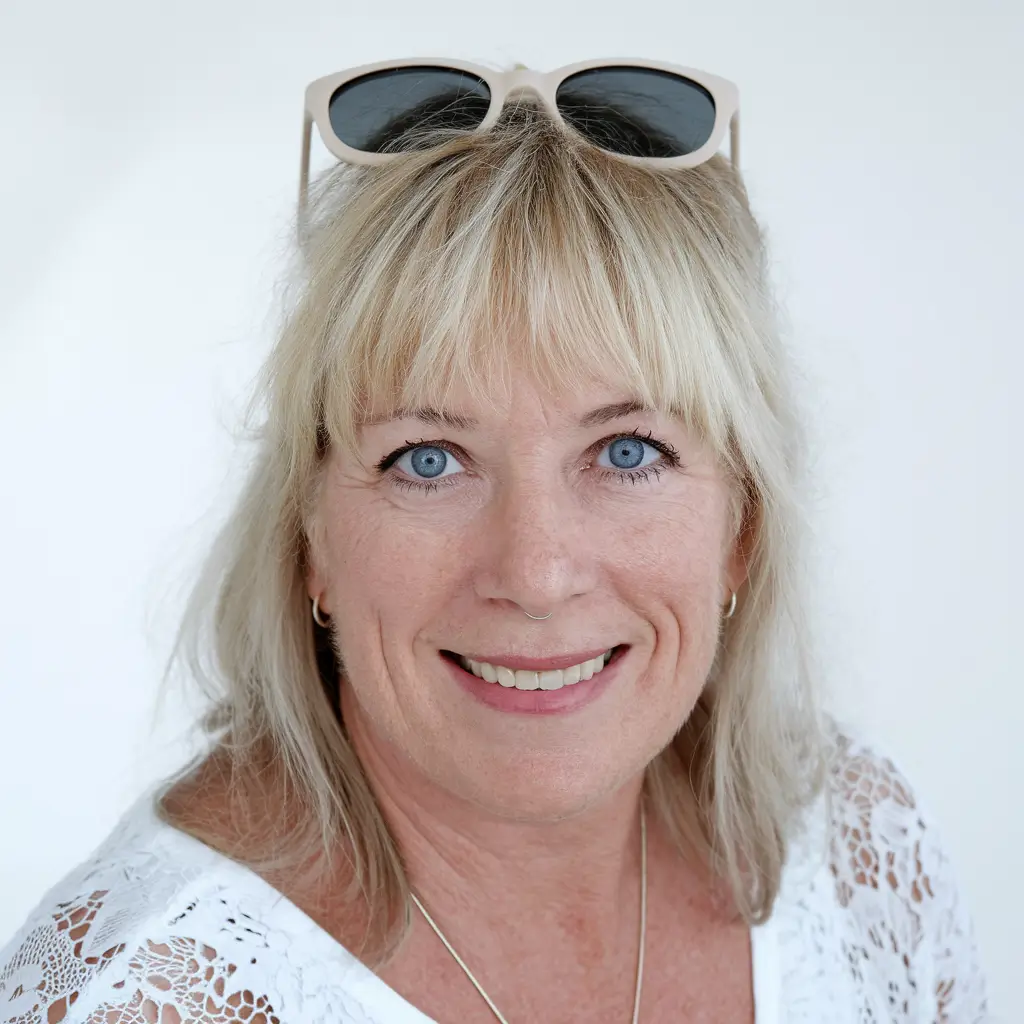 Fall haircuts women over 40 Classic Bangs with Light Fringe Layers