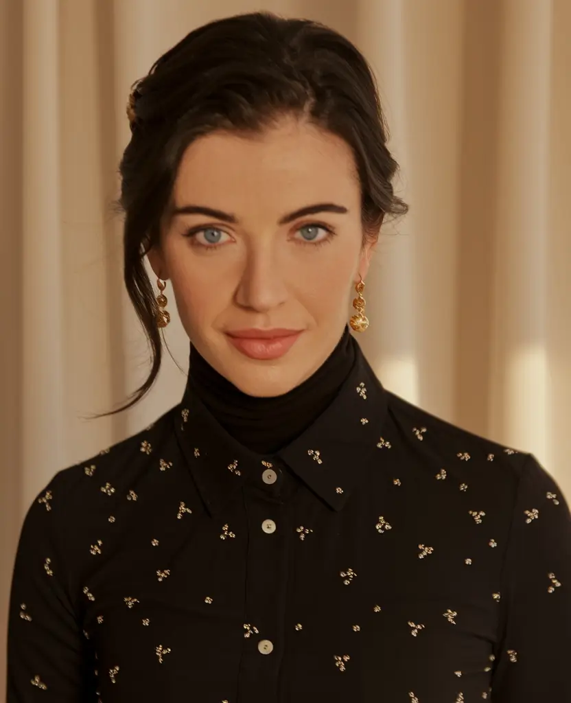 Fall haircuts women over 40 Low Bun with Side Volume and Elegant Texture