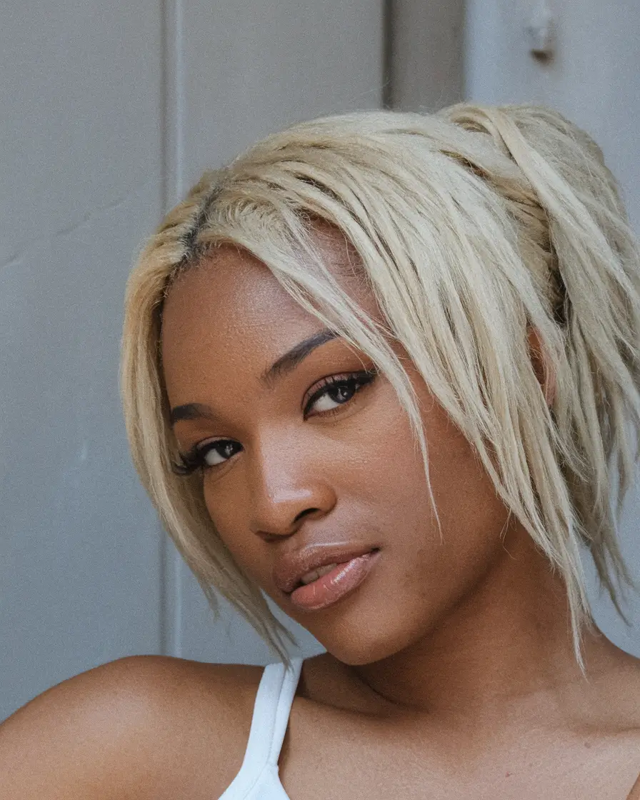 fall pixie hair color black women Textured Blonde Pixie with Tousled Bangs
