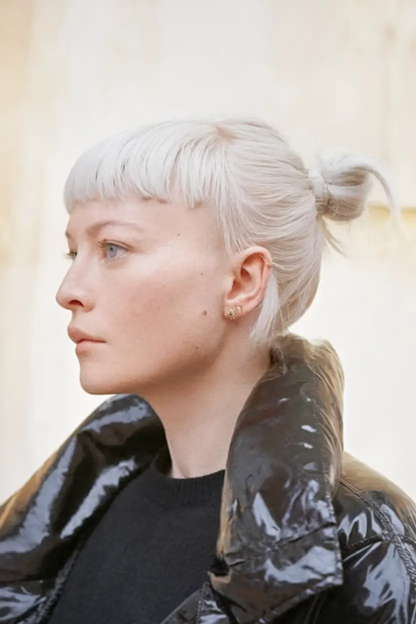 fall hair color for blondes 2025 Frosted Blonde with Sculpted Micro Fringe