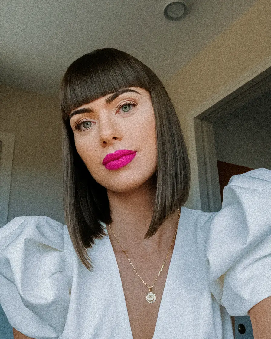 fall brunette hair color dark Structured Bob with a Blunt Bang