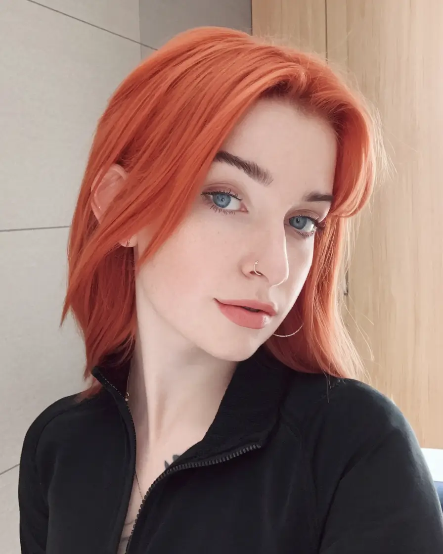 fall haircuts 2025 medium oval face Soft Layers and Fiery Volume
