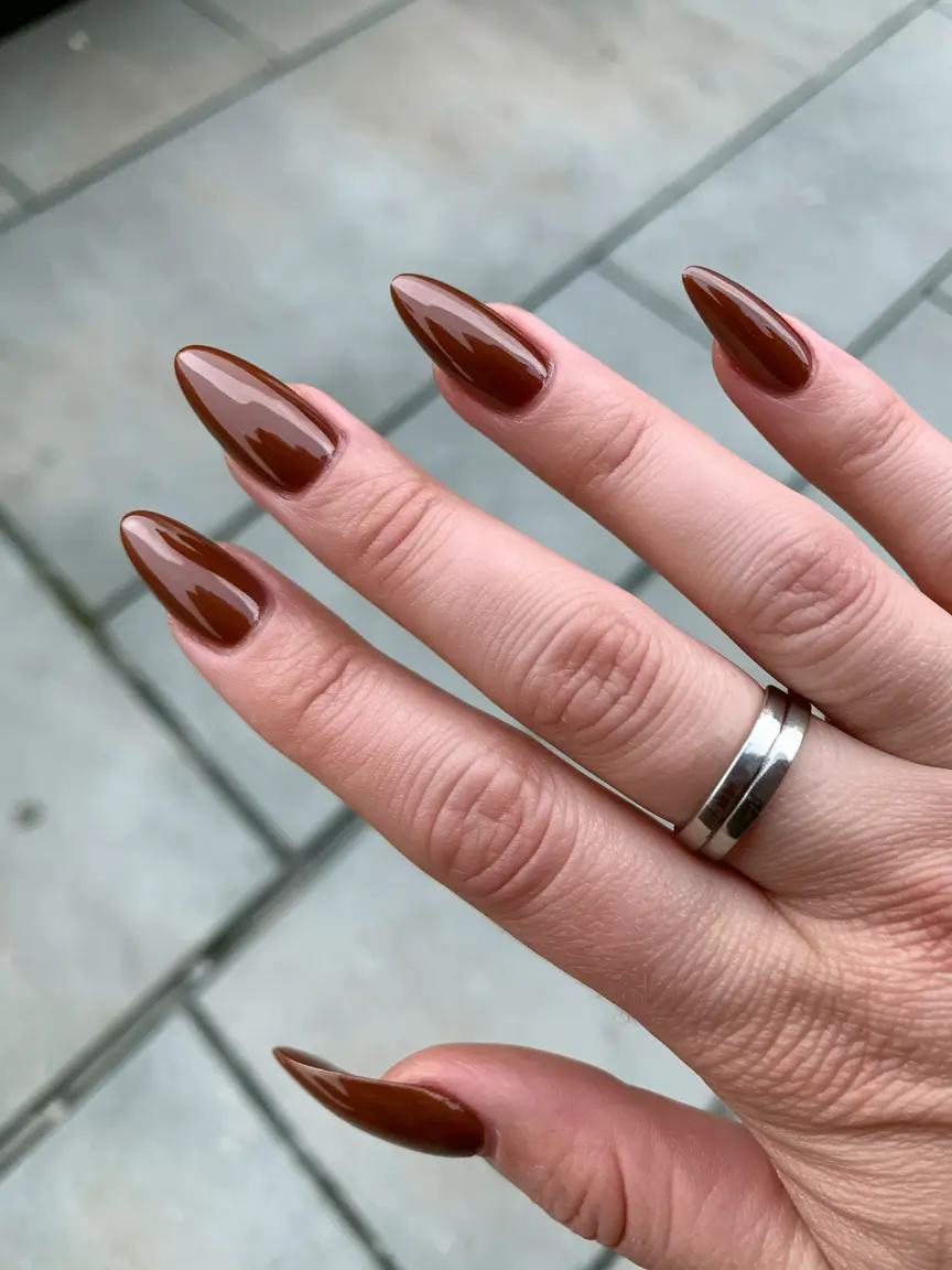 brown fall nails 2025 Glossy Chocolate Almond Elegance