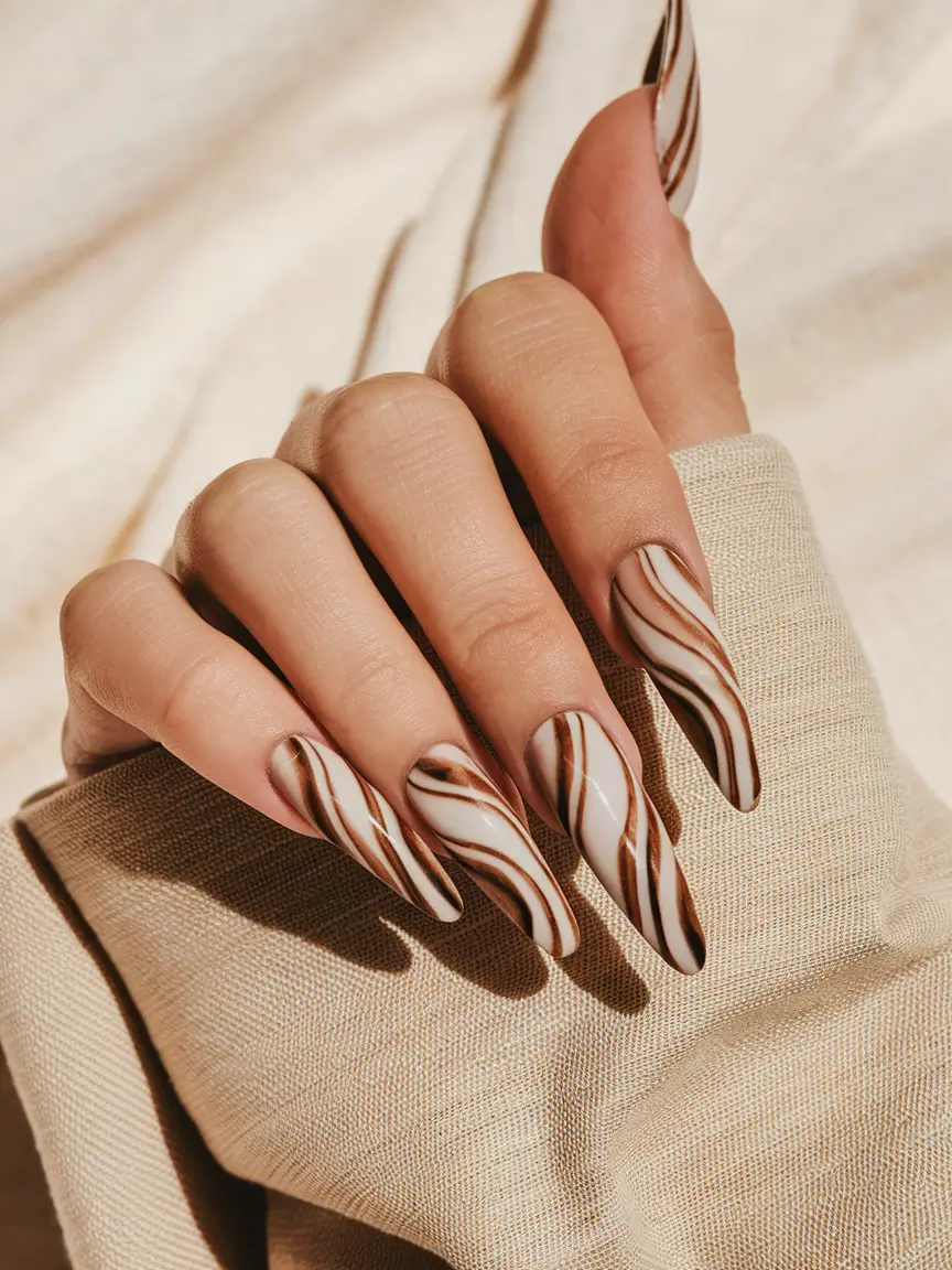 brown fall nails 2025 Cream-and-Coffee Swirl Coffin Nails