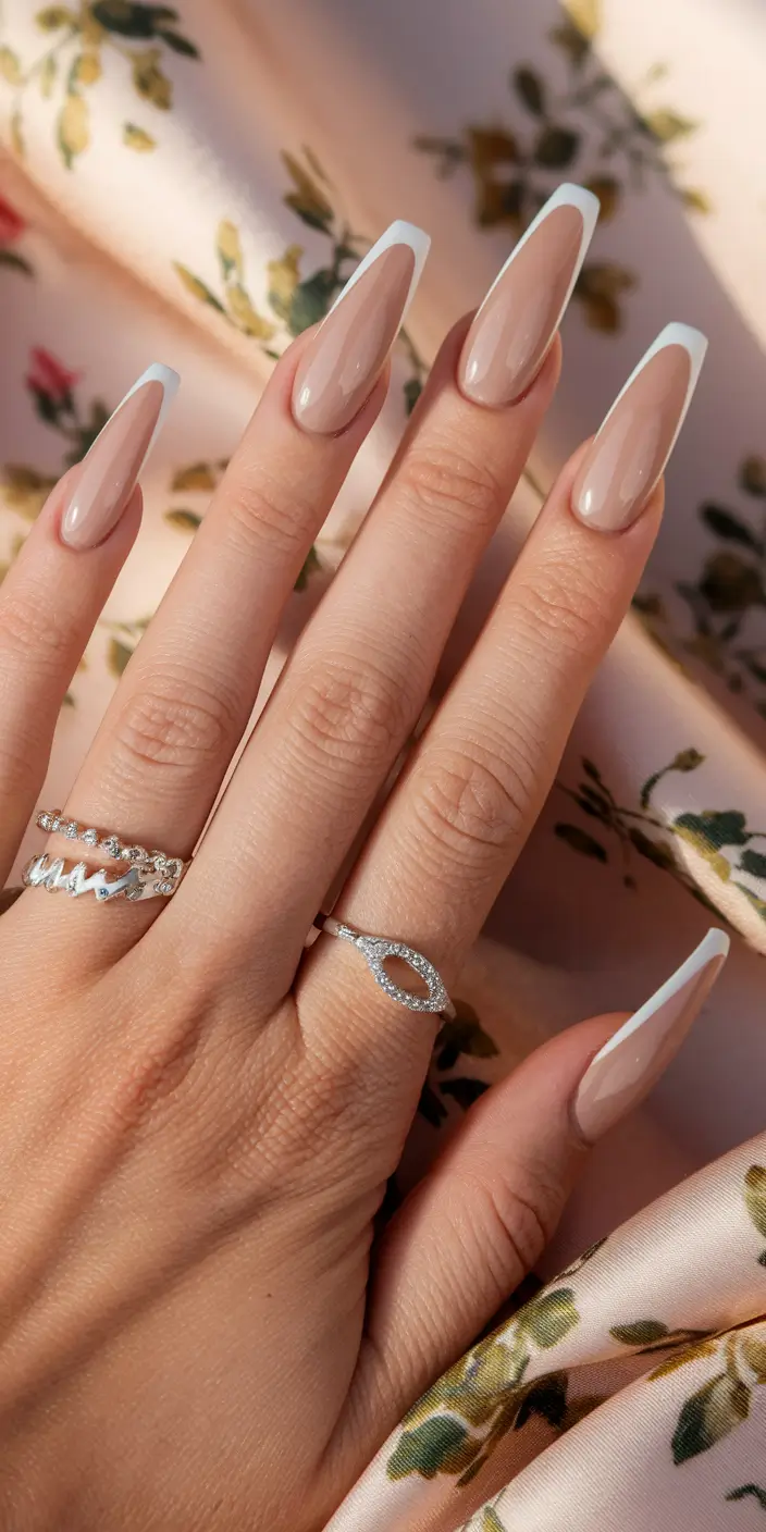 fall ballerina nails 2025 Modern French in Warm Nude