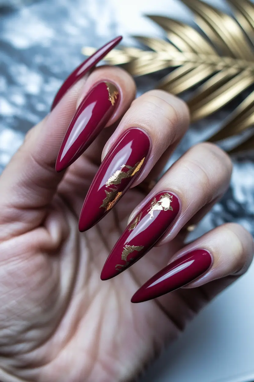 fall stiletto nails 2025 Rich Burgundy Glam with Gold Foil