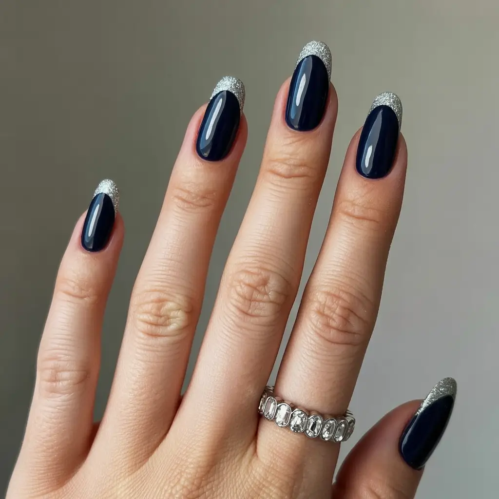 winter-nails-almond-designs-midnight-spark-with-silver-edge