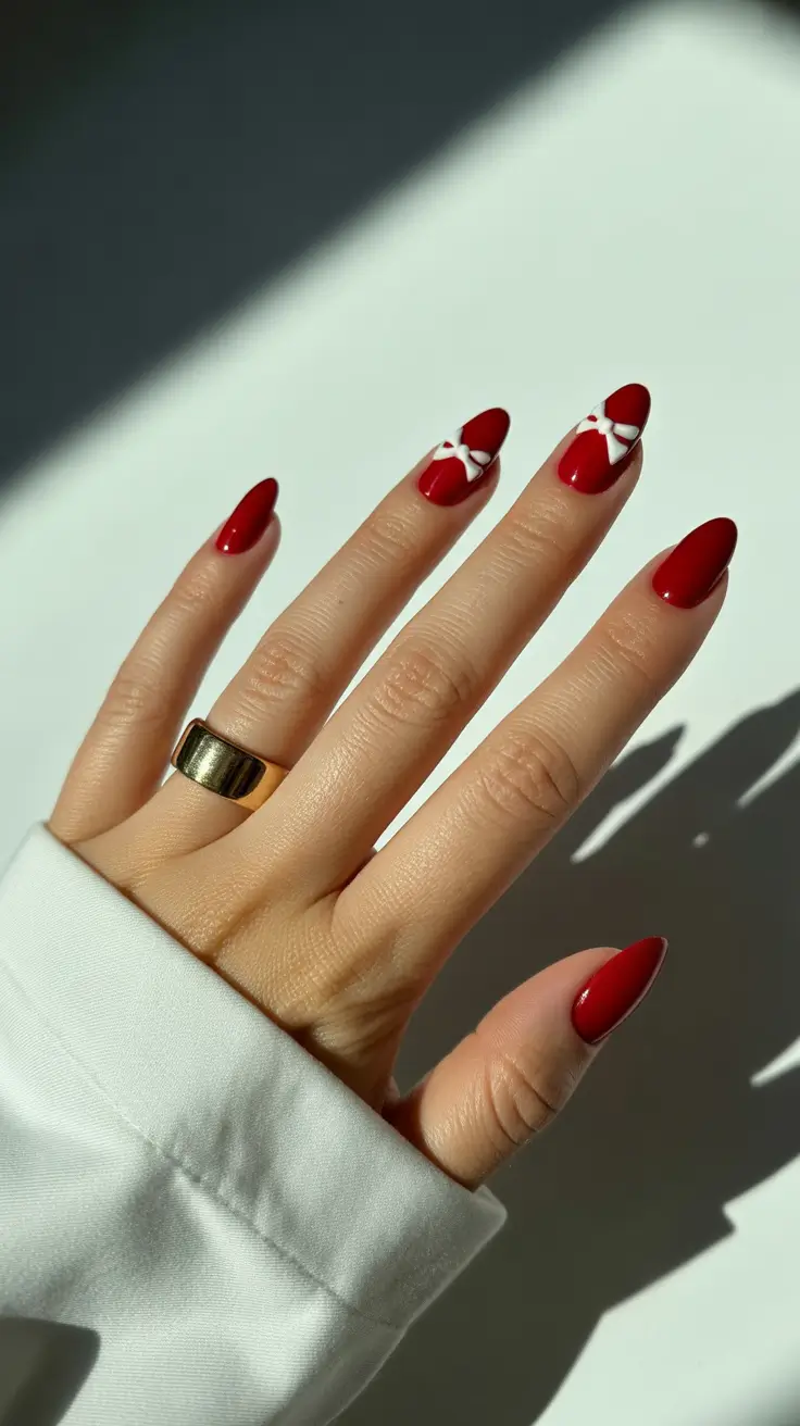 christmas-winter-nails-almond-designs-festive-bow-charm