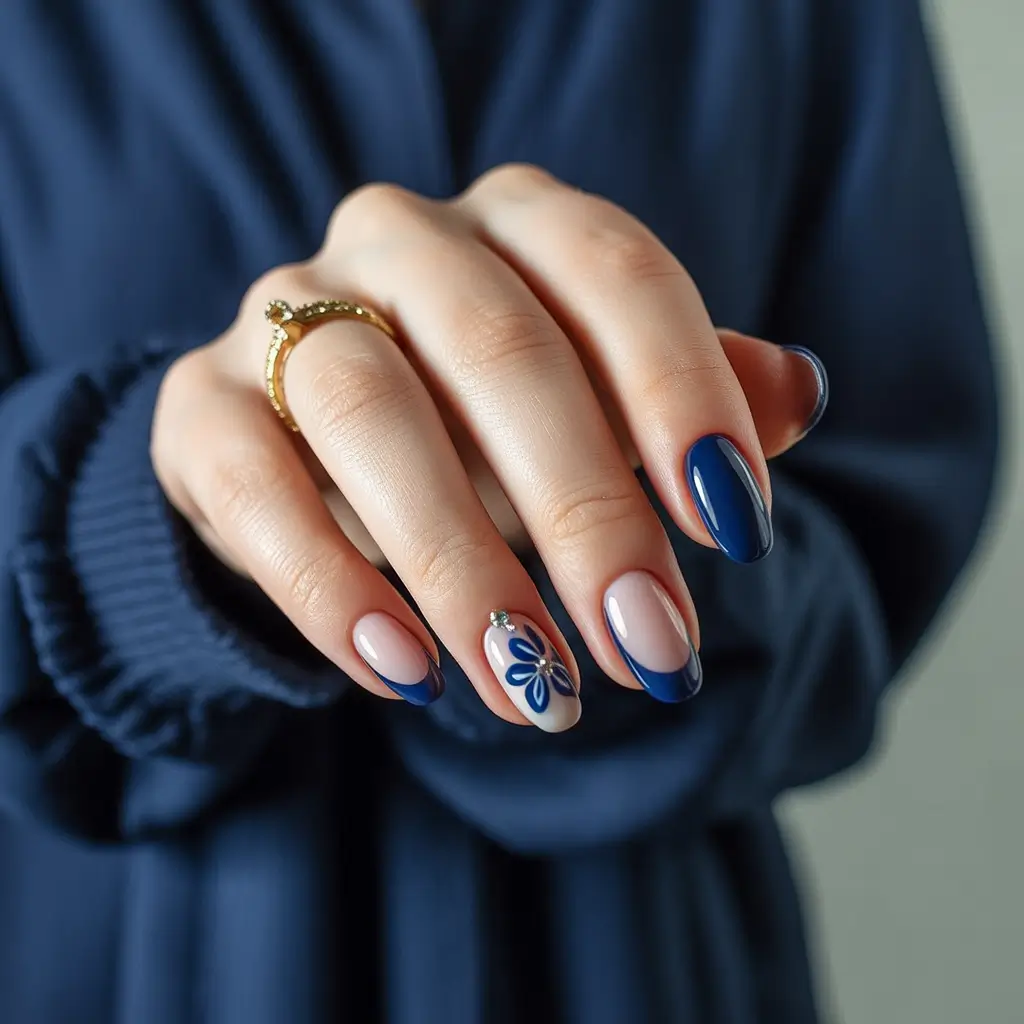 almond-nails-designs-winter-french-tip-blue-petal-accent