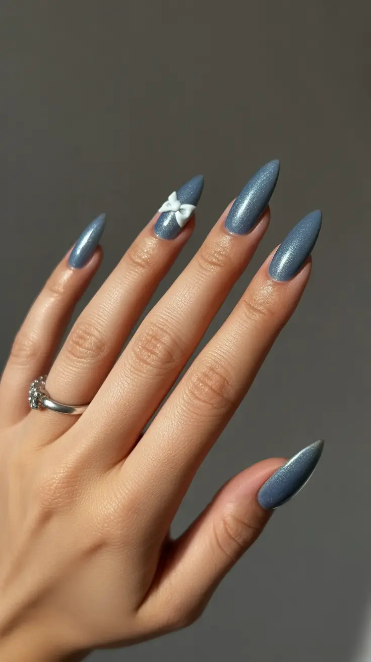 blue winter nails ideas Velvet Blue with a Bow