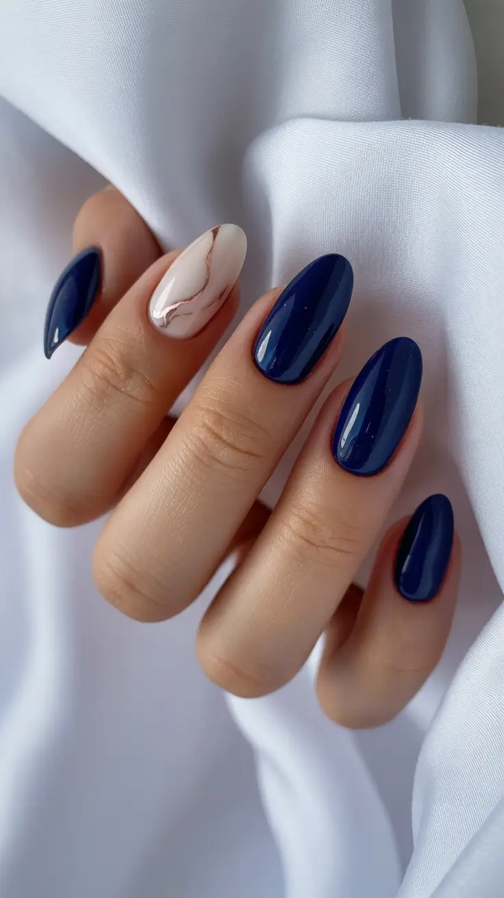 winter almond nails ideas 2025 Midnight Marble