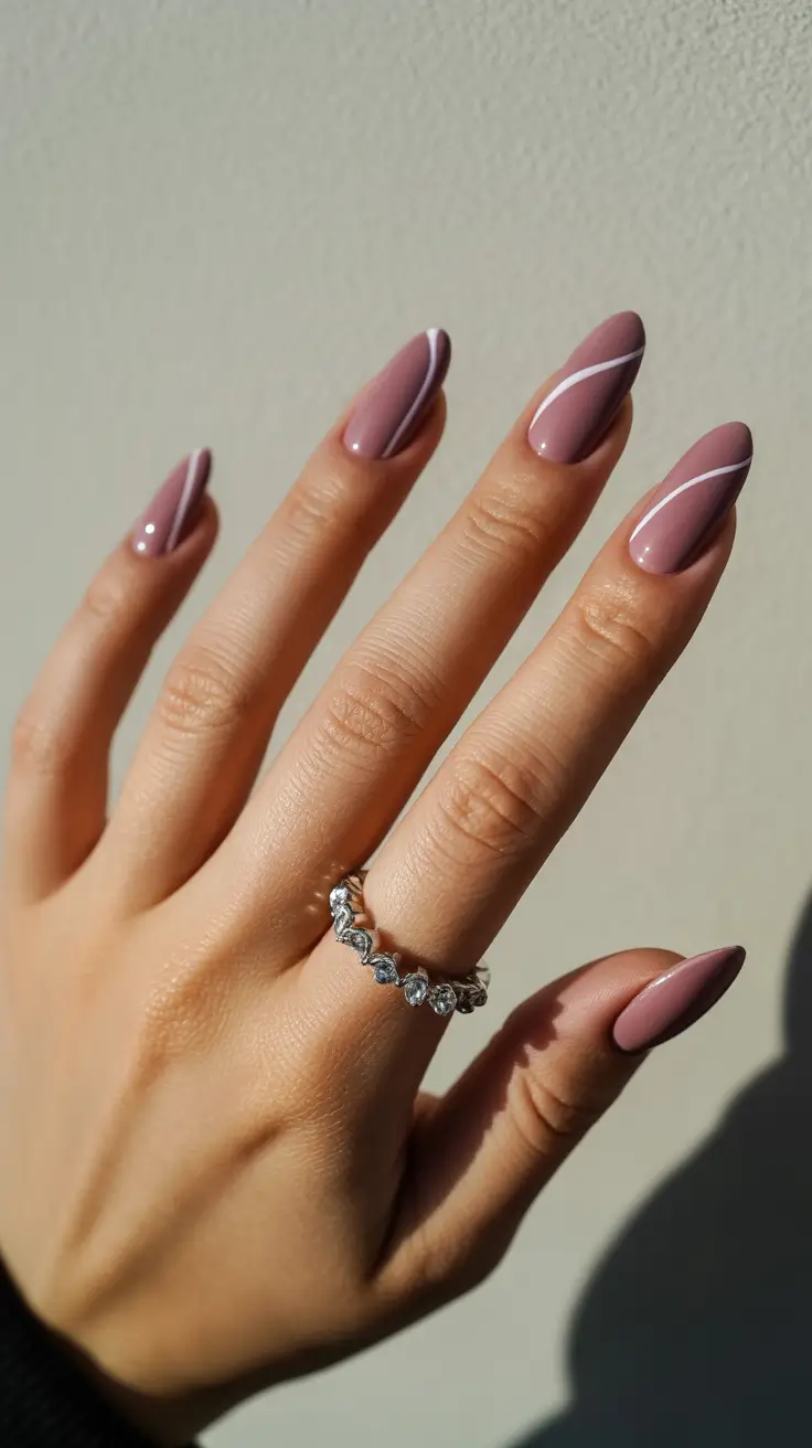 Trendy Winter Nail Colors 2025–2026 Muted Mauve Elegance