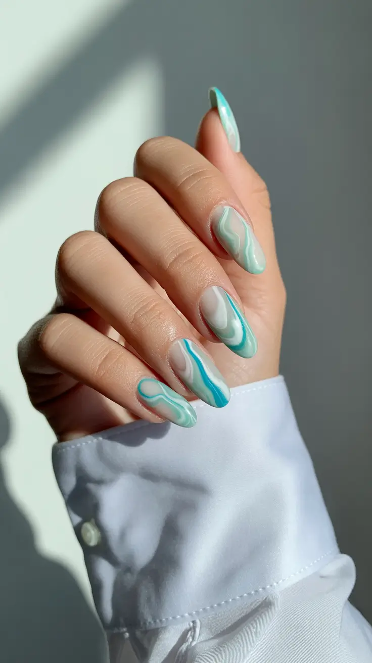 Trendy Winter Nail Designs & Colors 2025–2026 Mint Whisper Swirls
