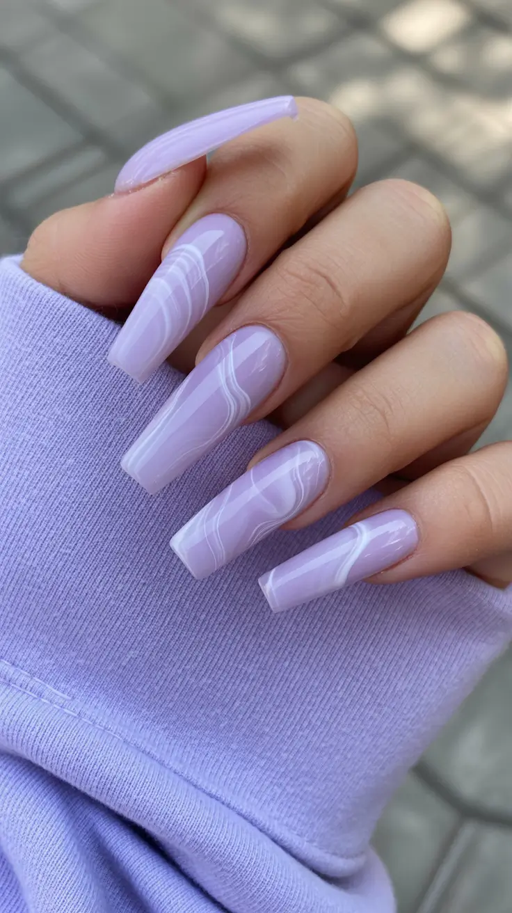 Trendy Winter Nail Designs & Colors 2025–2026 Lavender Marble Bliss