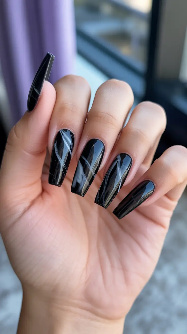 black nails ideas Glossy Black with Subtle Smoke Lines
