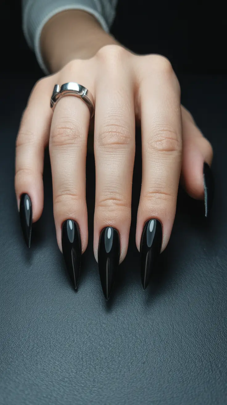 black nails ideas Sharp Stiletto Black for a Minimal Power Statement