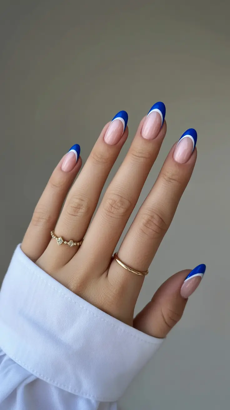 Blue nails trend 2026 Bold Cobalt Half-Moon French