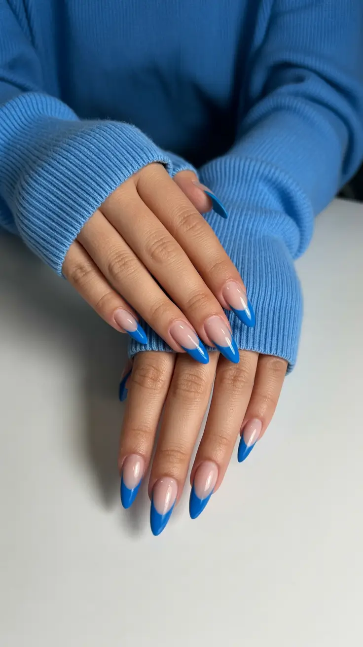 blue nails trend 2026 Sharp Sky-Blue French for Everyday Chic