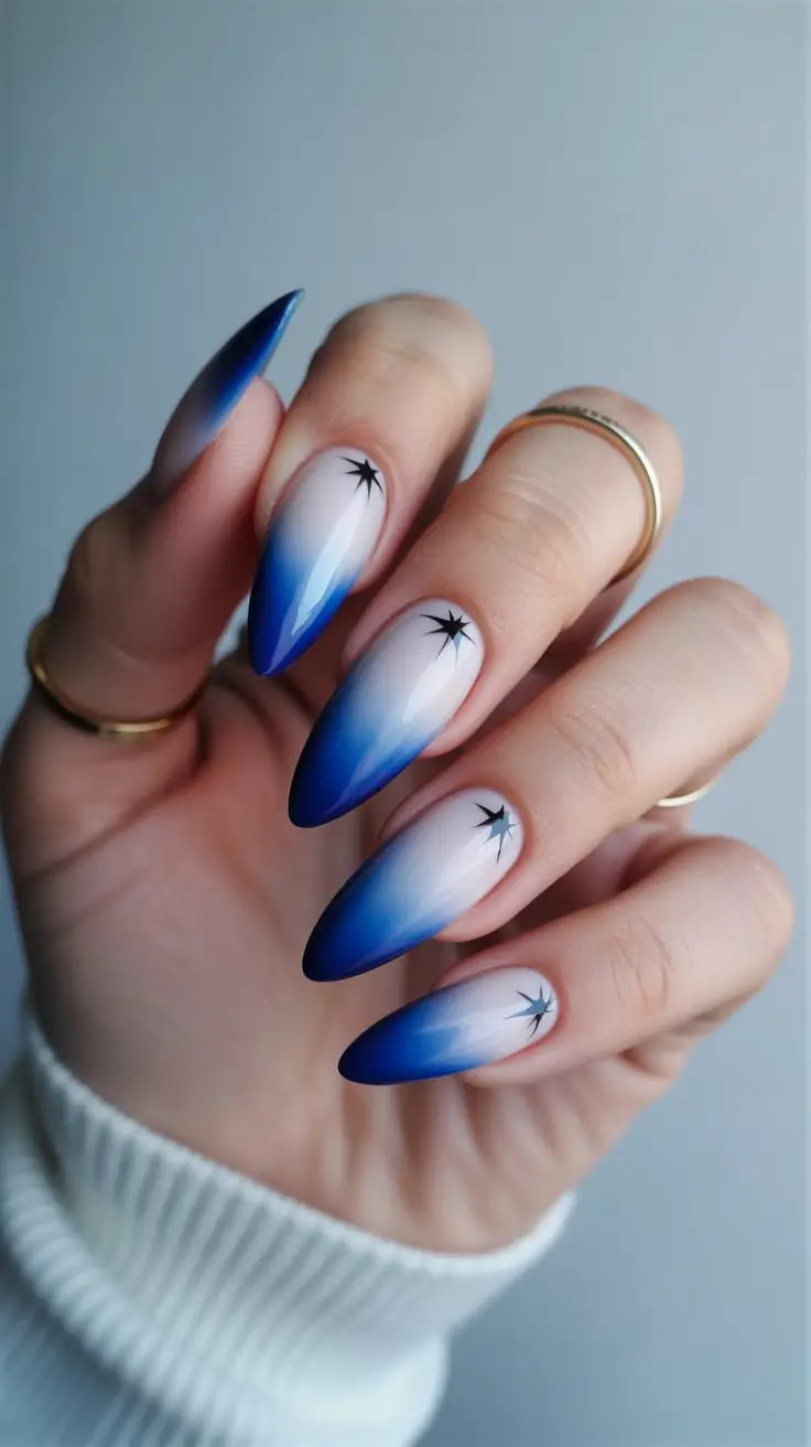 nails inspo ideas 2026 Frosted Blue Ombre With Star Accents