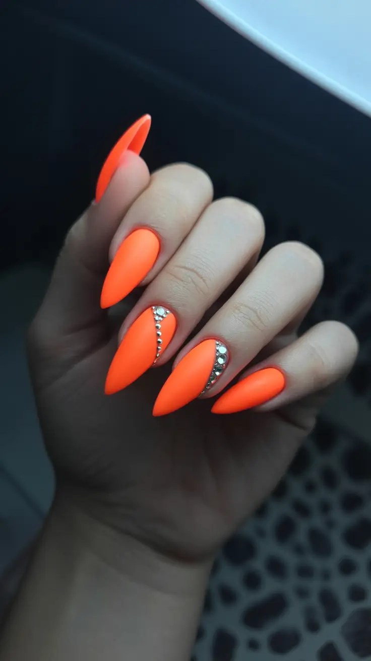 orange nail designs 2026 Matte Neon Luxe with Crystals