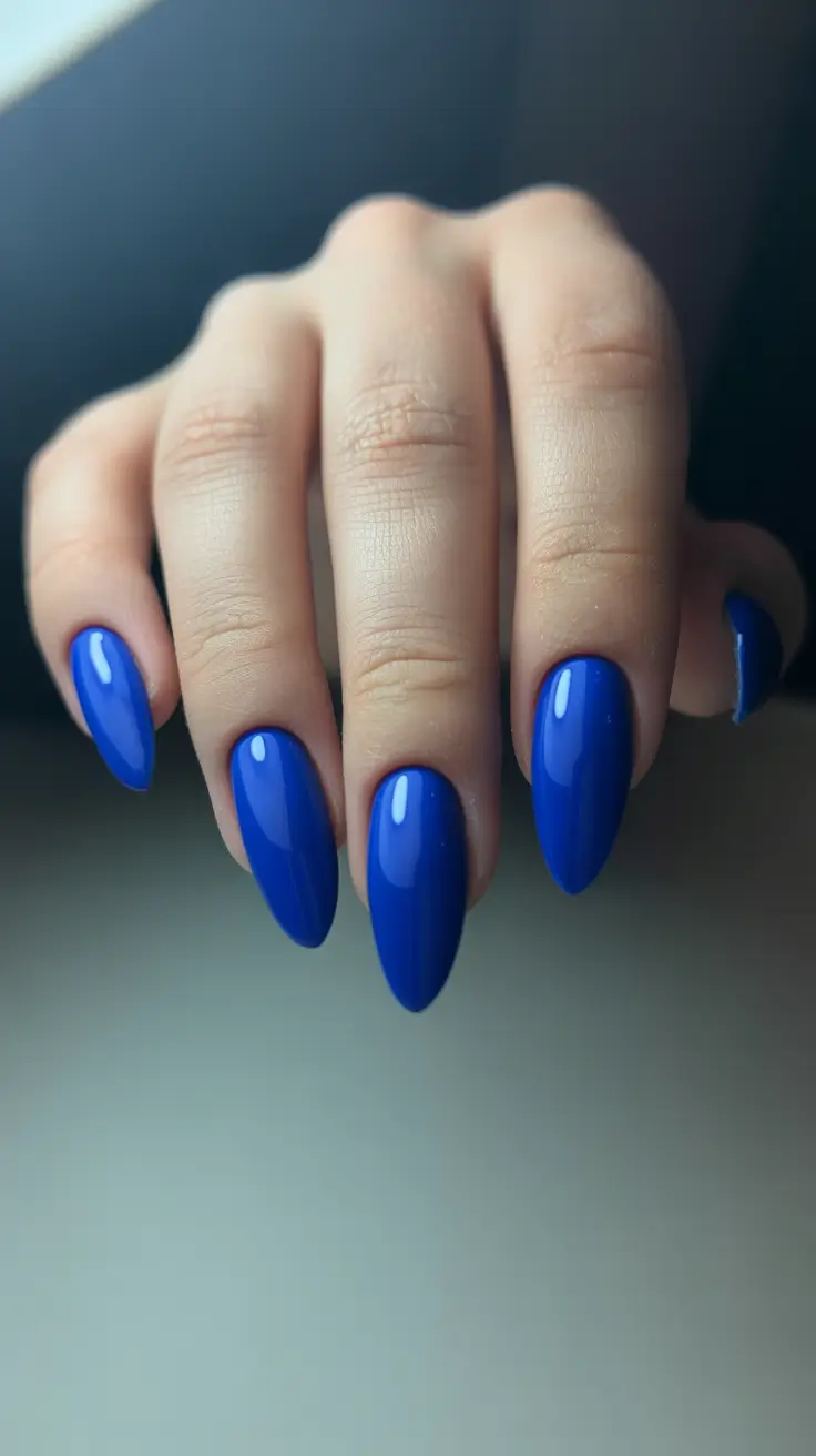 trendy acrylic nails 2026 Electric Blue Almonds for Bold Girly Confidence