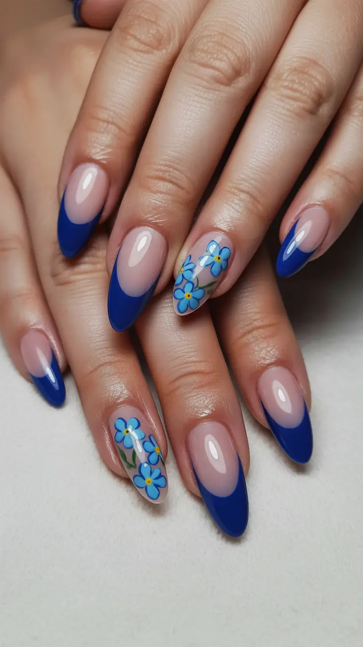 vacation nail designs 2026 - Blue Florals with a Modern French Twist