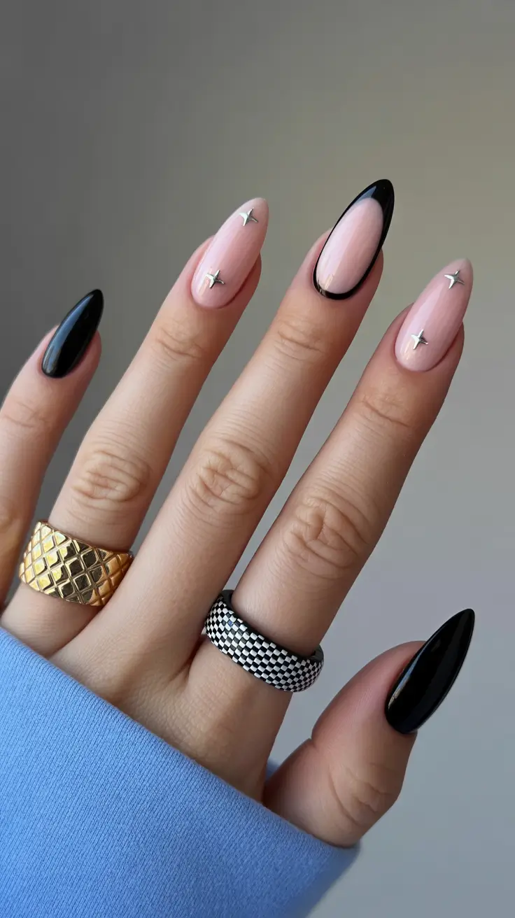 february nails ideas Star-Studded Almond With Chic Black Details