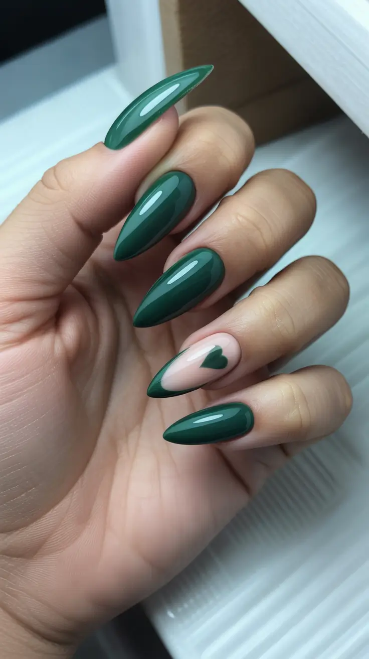 february nails ideas Deep Emerald Almond With a Minimal Heart Accent