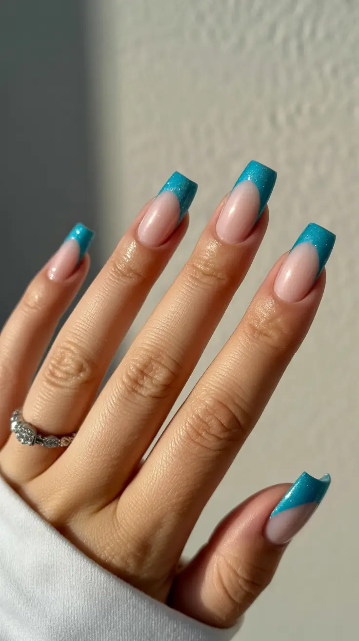 classy spring french tip nails 2026 Turquoise Micro Glitter French on Sculpted Square