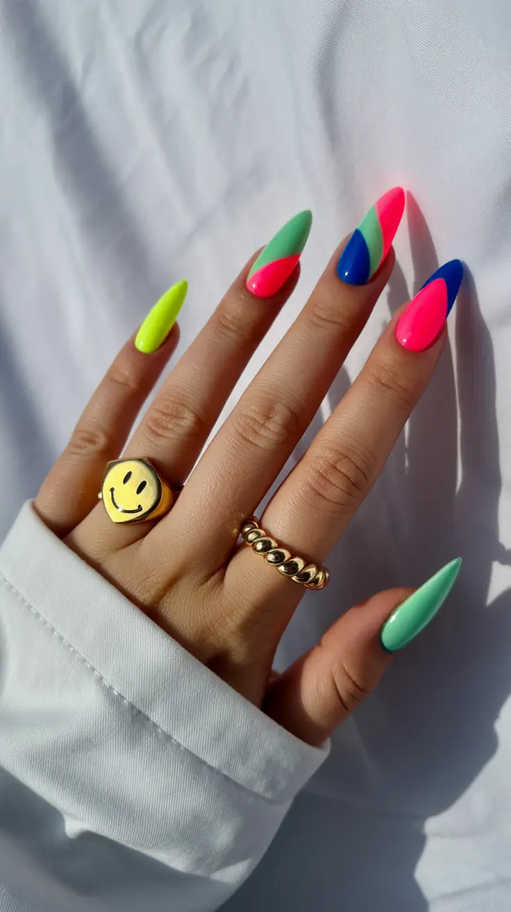 april nails ideas 2026 Playful neon color block almond mood