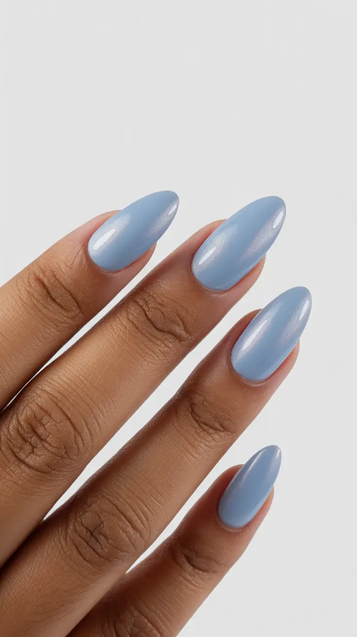 graduation nails ideas 2026 Soft Powder Blue Almond Nails for a Calm Graduation Look