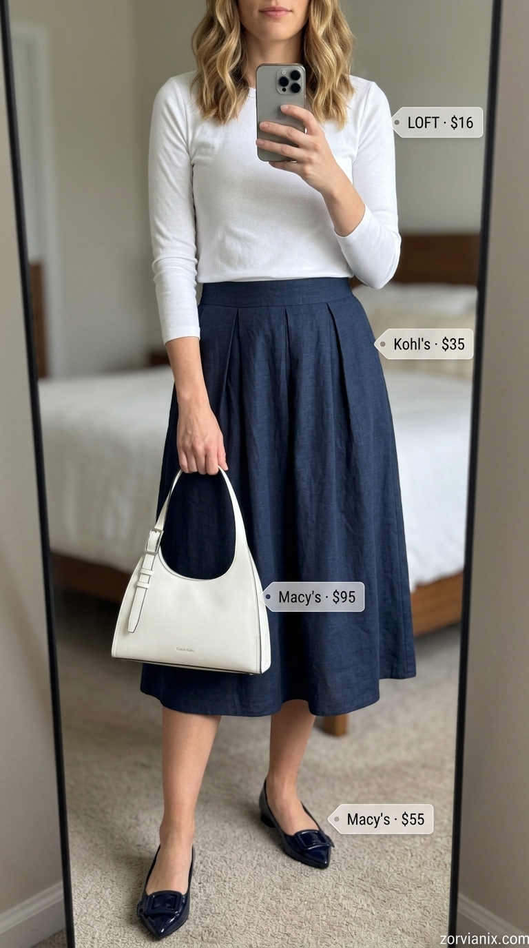 Modest Summer Outfits 2026: Polished Skirt Style Modest summer outfits for women 2026: Navy midi skirt, white long-sleeve top, silver earrings, ballet flats.