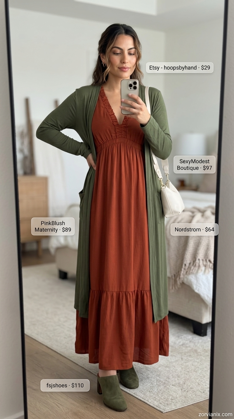 Modest Summer Outfits 2026: Elegant Maxi Dress Modest summer outfits for women 2026: Terracotta maxi dress, olive heels, ivory crossbody bag, gold earrings.