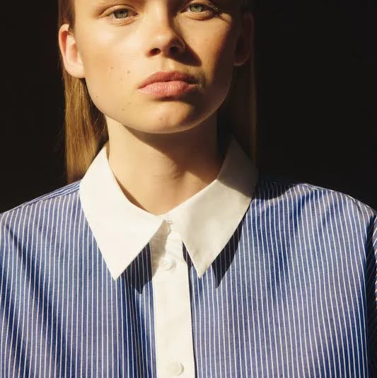 top H&M Ladies Oversized Striped Poplin Shirt H&M $24.99