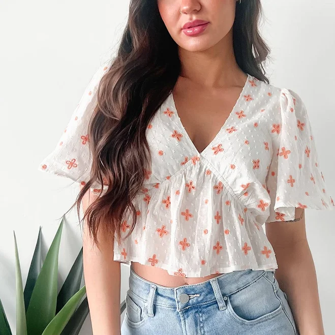 top Irresistible Feelings Flutter Sleeve V-Neck Top NanaMacs $28.99