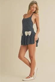 romper Navy/Ivory Polka Dot Halter Romper with Front Bow Details Sophie’s Event Wear and More $58