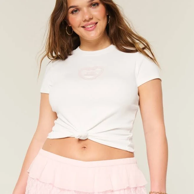 top Women's Hollister Polly Pocket Graphic Baby Tee Hollister Co - Official $4.97