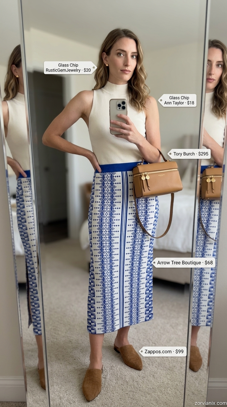 Cobalt blue abstract print midi skirt outfit for a gallery opening in 2026. Artsy sophisticated style.