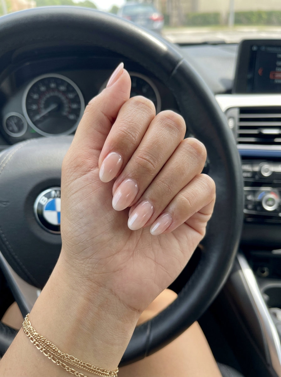 Glazed Donut Nails 2026: Elegant Summer Style Elegant milky nude glazed donut nails with subtle pink undertones for colourful summer nails 2026. Minimalist and chic.
