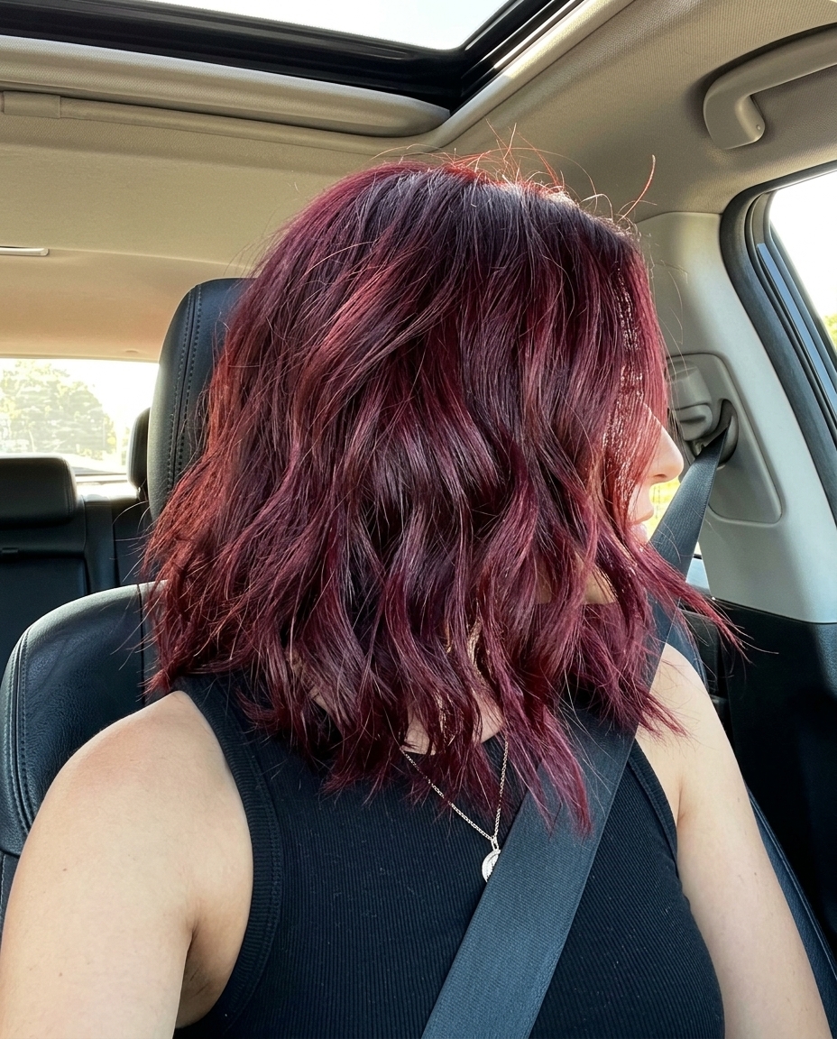 long deep cherry red with violet undertones, single process color — edgy music festival