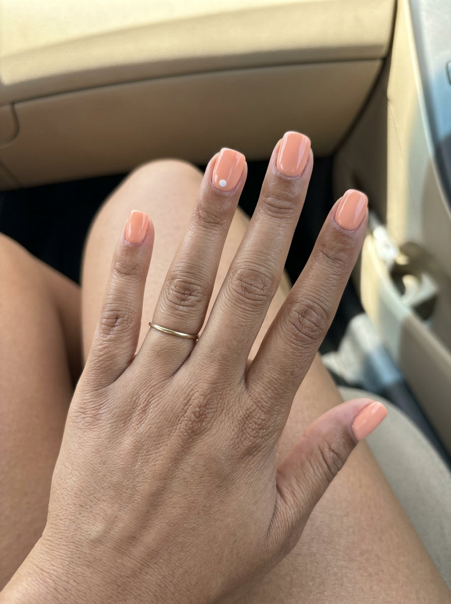Peach dot accent squoval nails for simple short summer nails 2026. Playful and chic for casual outings.