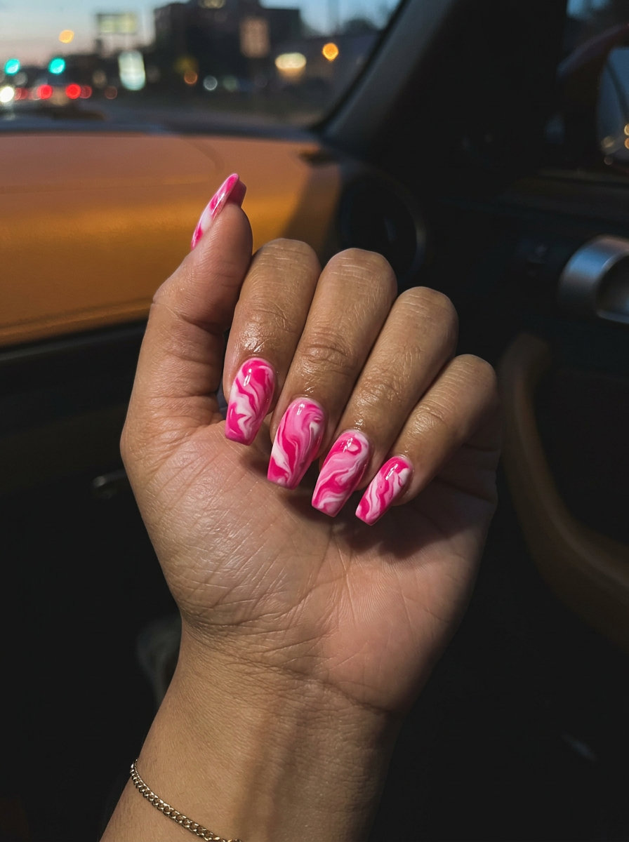 Hot Pink Marble Nails 2026: Date Night Glam Hot pink marble nails for a date night or summer party, featuring vibrant cool-toned pink and crisp white gel polish.