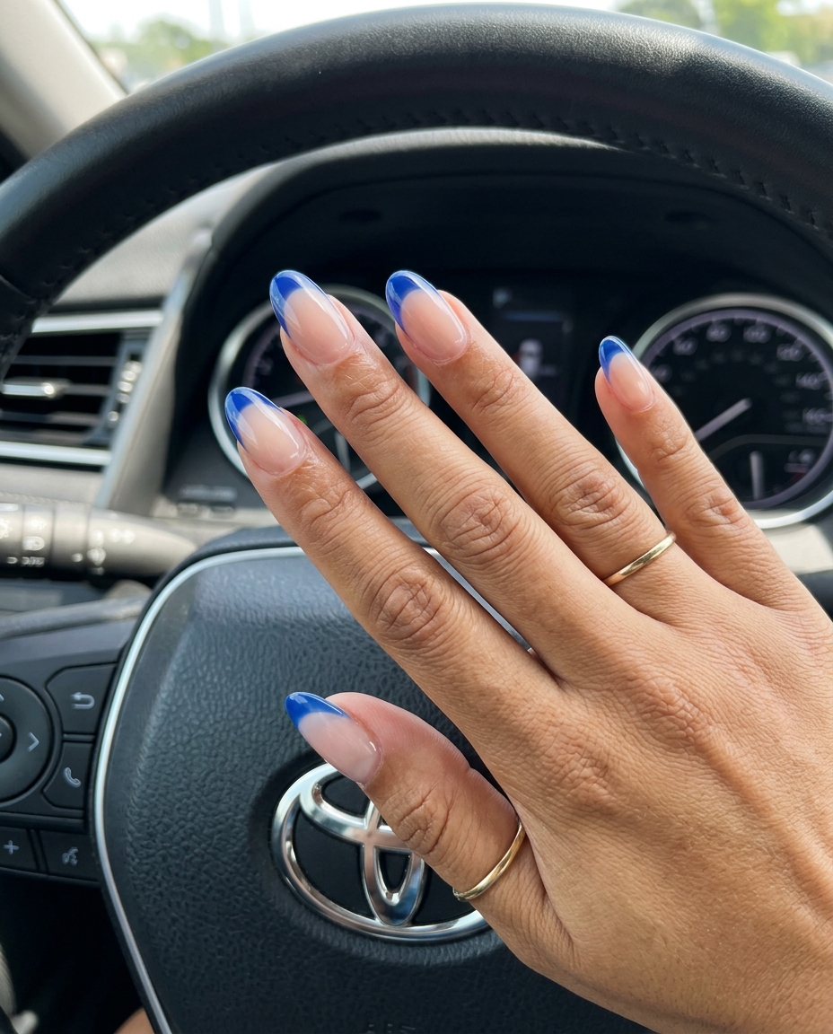 Sophisticated cobalt blue jelly French tip oval nails for chic summer colorful nails designs 2026 work.