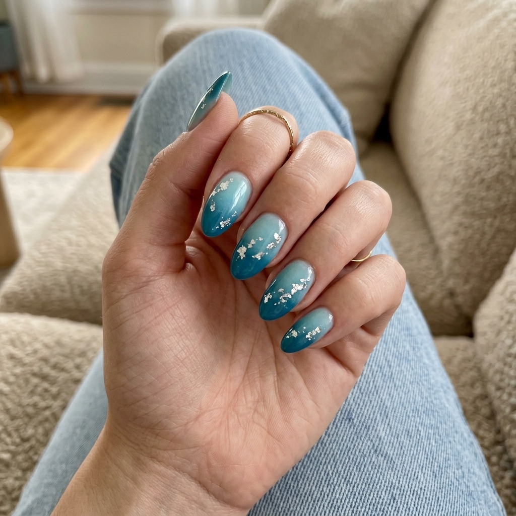 Oceanic foil ombre nails with teal and silver foil for vacation or beach days. Relaxed, ethereal summer nail manicure ideas 2026.